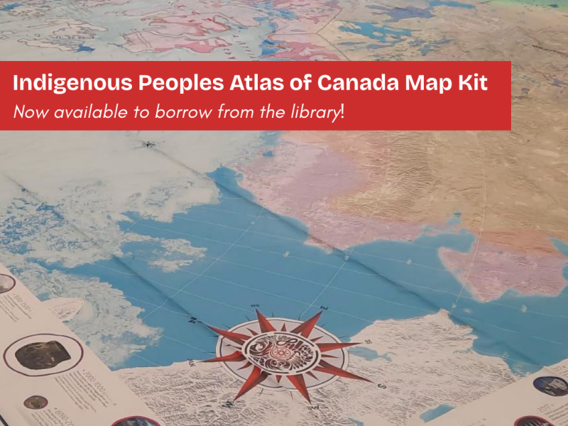 Indigenous Peoples Atlas of Canada map kit now available to borrow from the library. Image of corner of map in the background.