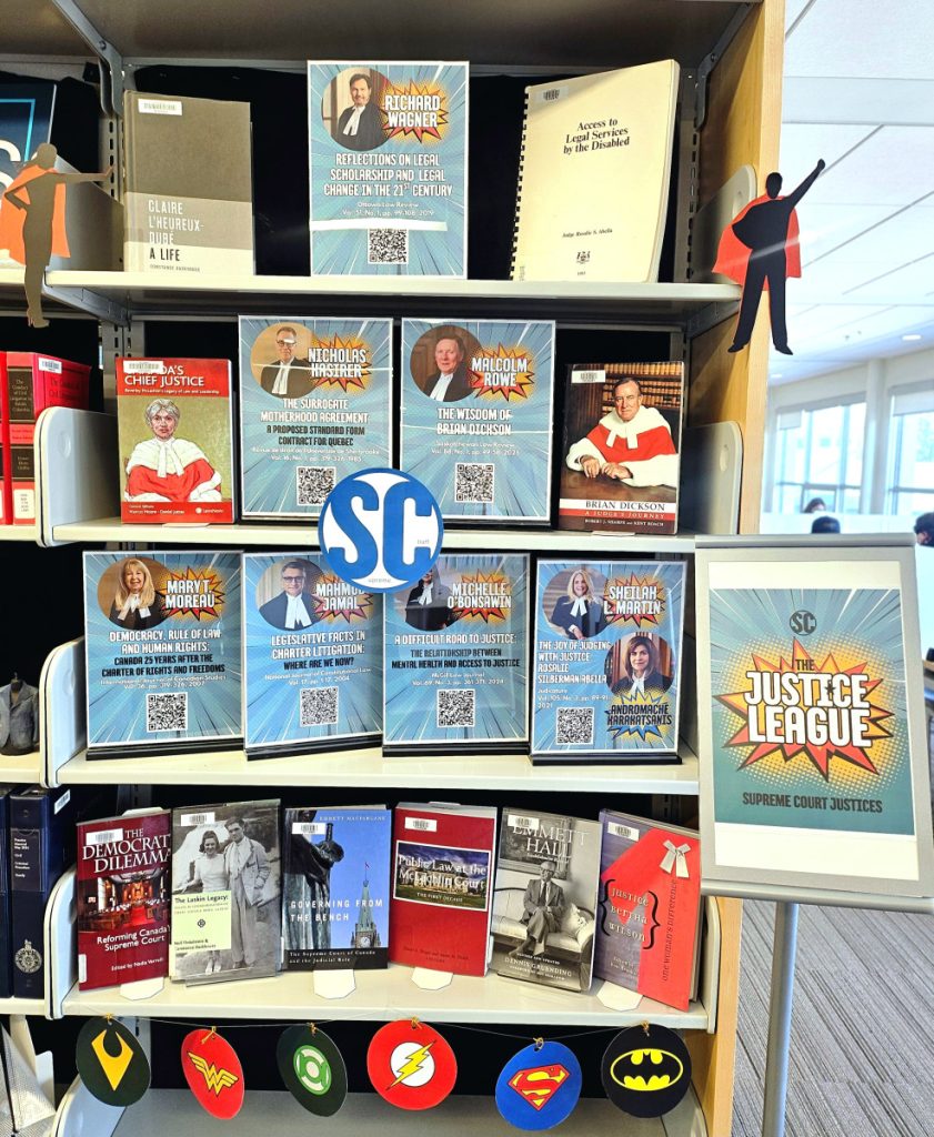 Justice League display in the law library featuring supreme court justices biographies, books about the supreme court in canada.