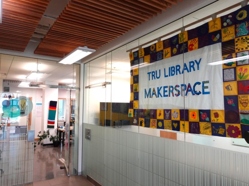 TRU Library Makerspace banner hanging in the entrance to the right of Tim Hortons.